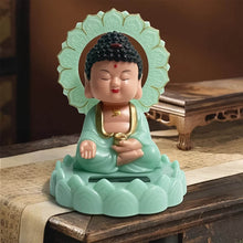 Plastic Solar Powered Moving Head Sitting Action Buddha Statue (1 Pc / Mix Color) - dailyneed.life