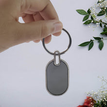 Elegant Black & Silver Oval Metal Keychain (1 Pc) - dailyneed.life