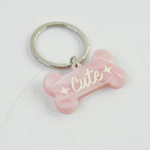 Cute Bone-Shaped Acrylic Keychain with Stylish Typography - dailyneed.life