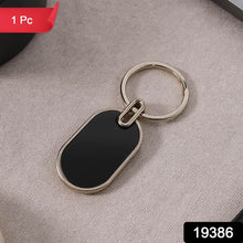 Elegant Black & Silver Oval Metal Keychain (1 Pc) - dailyneed.life