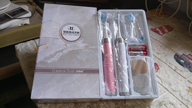 Adult Waterproof Electric Toothbrush Strong Sonic Charging with 4 Toothbrush Head and a toothbrush holder - dailyneed.life
